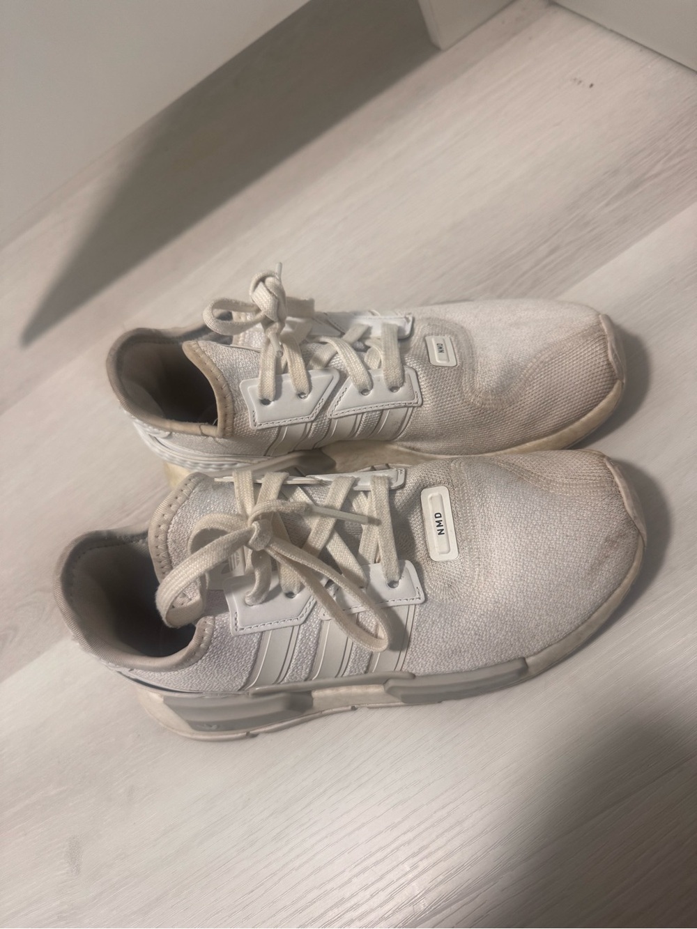 White Adidas NMD shoes